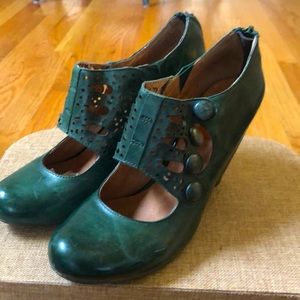 Unique green heels. Zipper backs